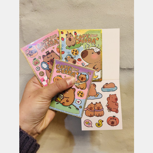 Libreta de stickers capibara