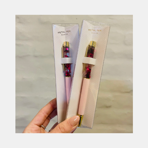 Lapicera rosa en caja