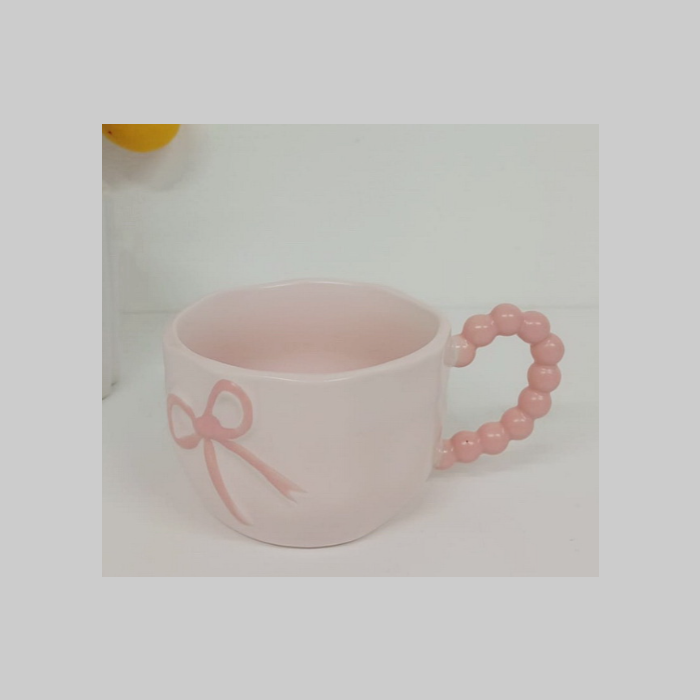 Taza ceramica moño